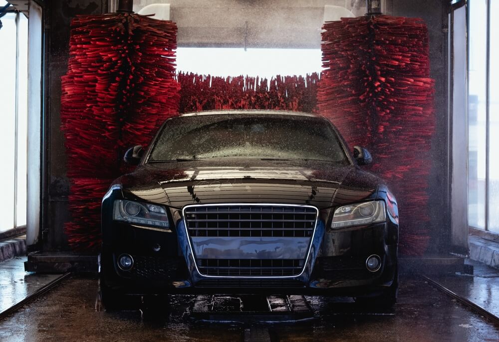 The,Black,Car,Is,On,An,Automatic,Car,Wash,And