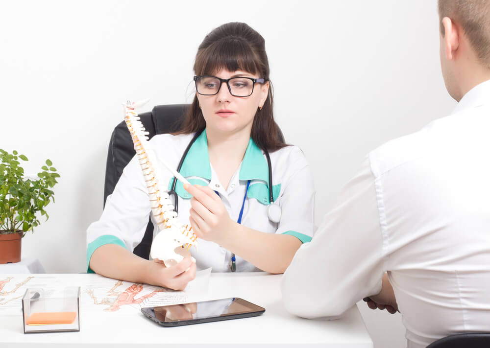 The,Doctor,Explains,To,The,Patient,On,The,Layout,Of