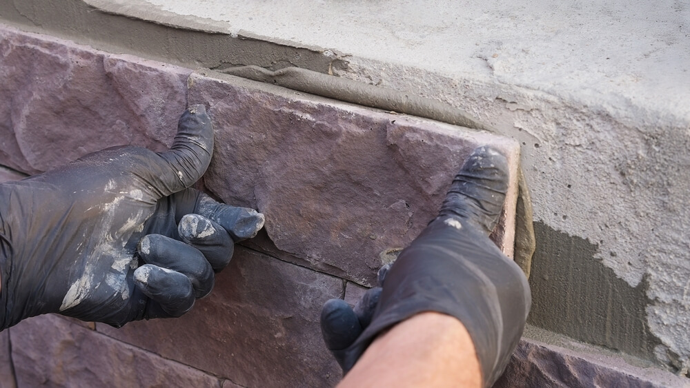 Close-up,Of,Masonry,Work,As,A,Construction,Worker,Installs,Decorative